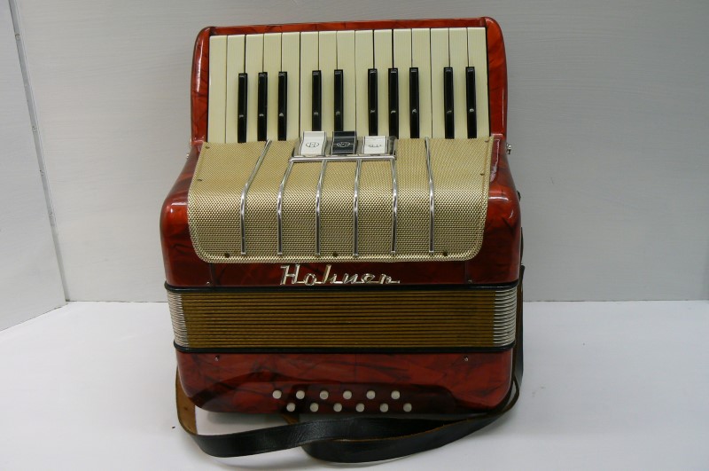 SMALL M HOHNER ACCORDION MARBLE RED WITH GOLD ACCENTS. MADE IN GERMANY