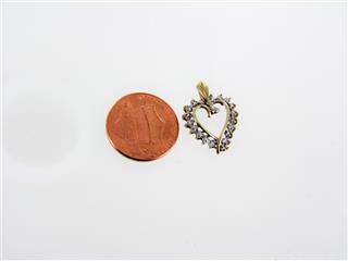 10 KT GOLD PENDANT HEART 0.9DWT/YG