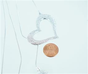 14KT WHITE GOLD NECKCHAIN WITH 2 HEARTS 2.69 ATW 24