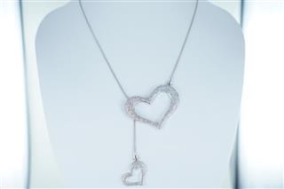 14KT WHITE GOLD NECKCHAIN WITH 2 HEARTS 2.69 ATW 24