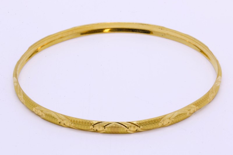 pre owned solid gold bangle
