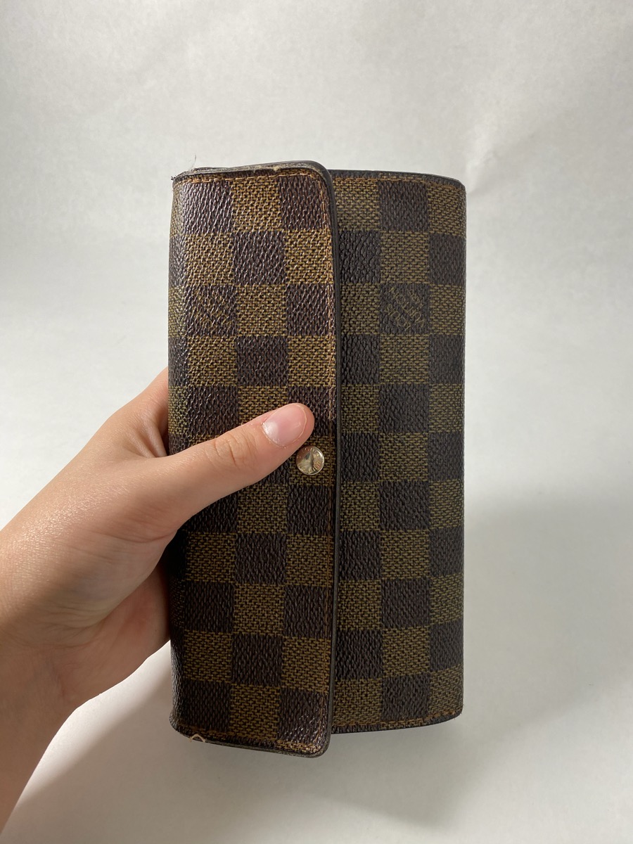 louis vuitton sarah wallet date code location
