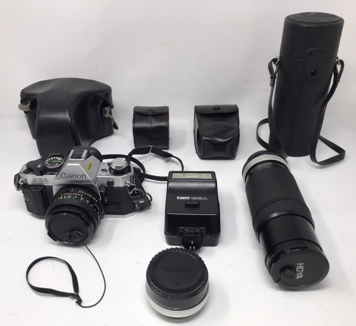 Canon AE1 Program SLR 35mm Film Camera Kit w/Lenses Converter & Flash Good Buya