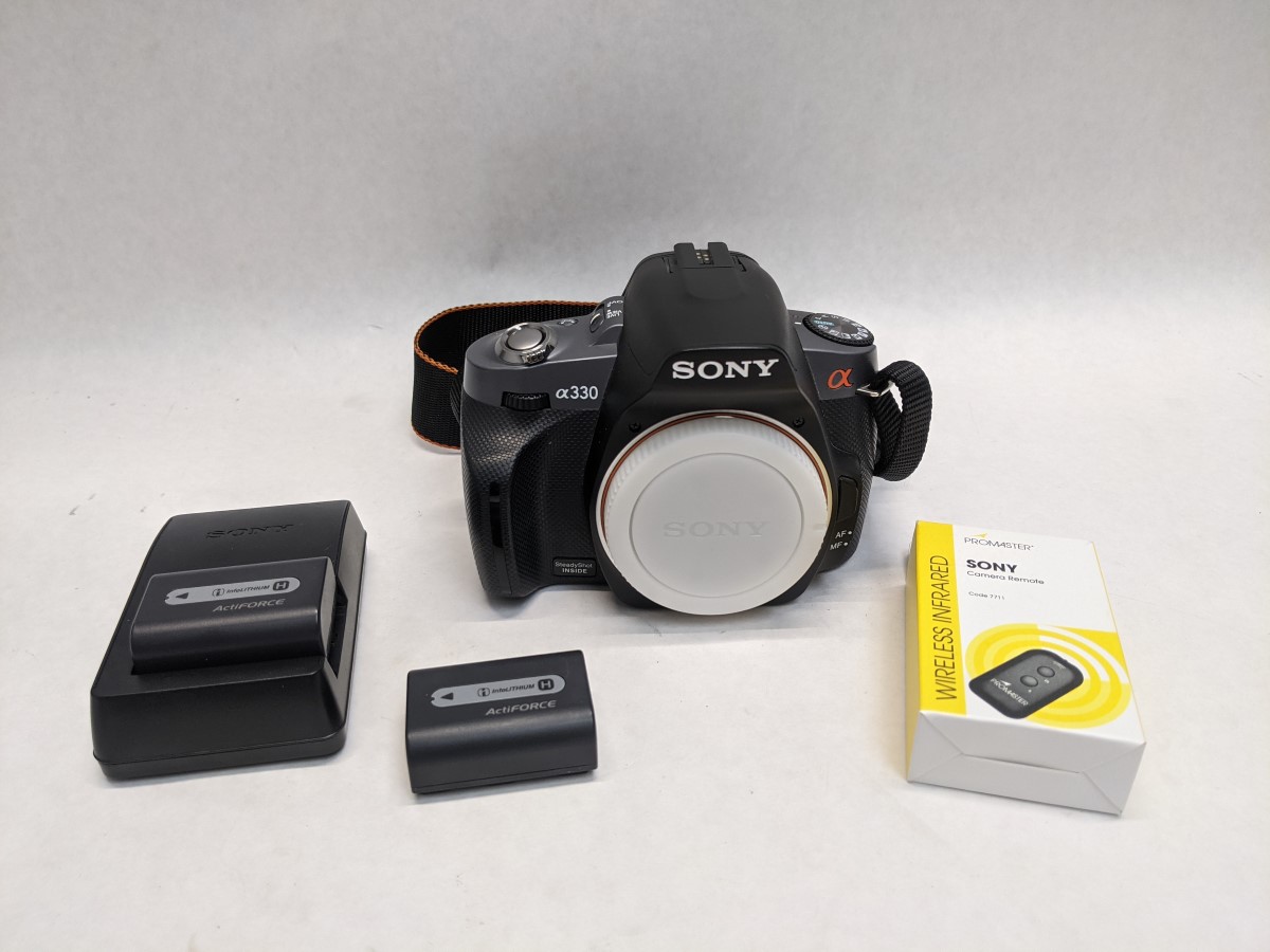 Sony Alpha DSLRA330 Camera 10.2MP (Body Only) See Photos Good