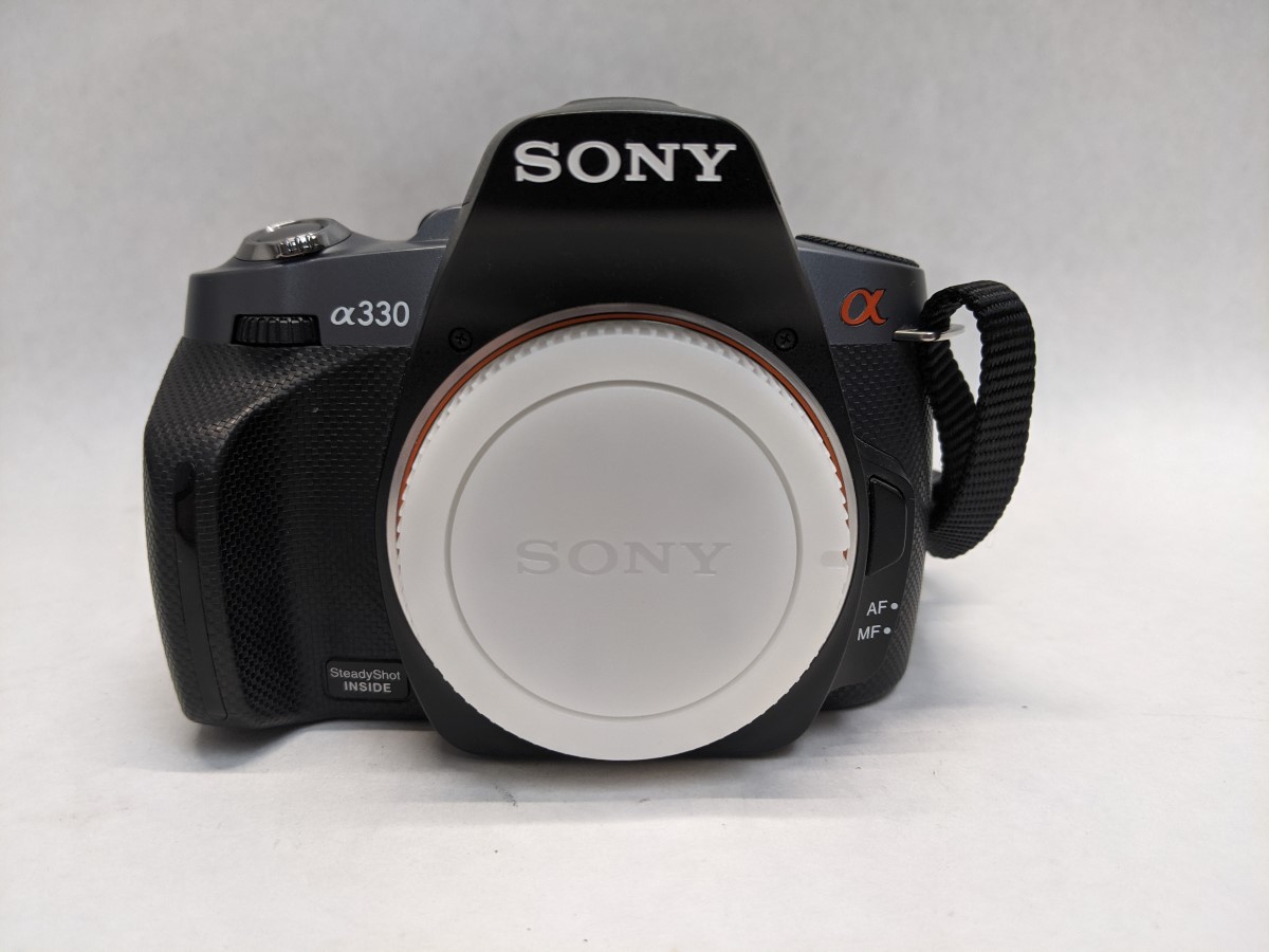 Sony Alpha DSLRA330 Camera 10.2MP (Body Only) See Photos Good