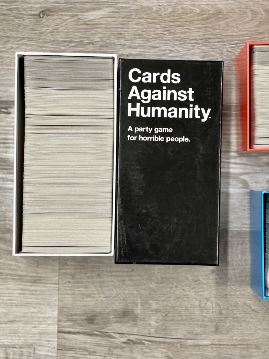 Cards Against Humanity w/ 4 Expansion Packs Brand New Buya