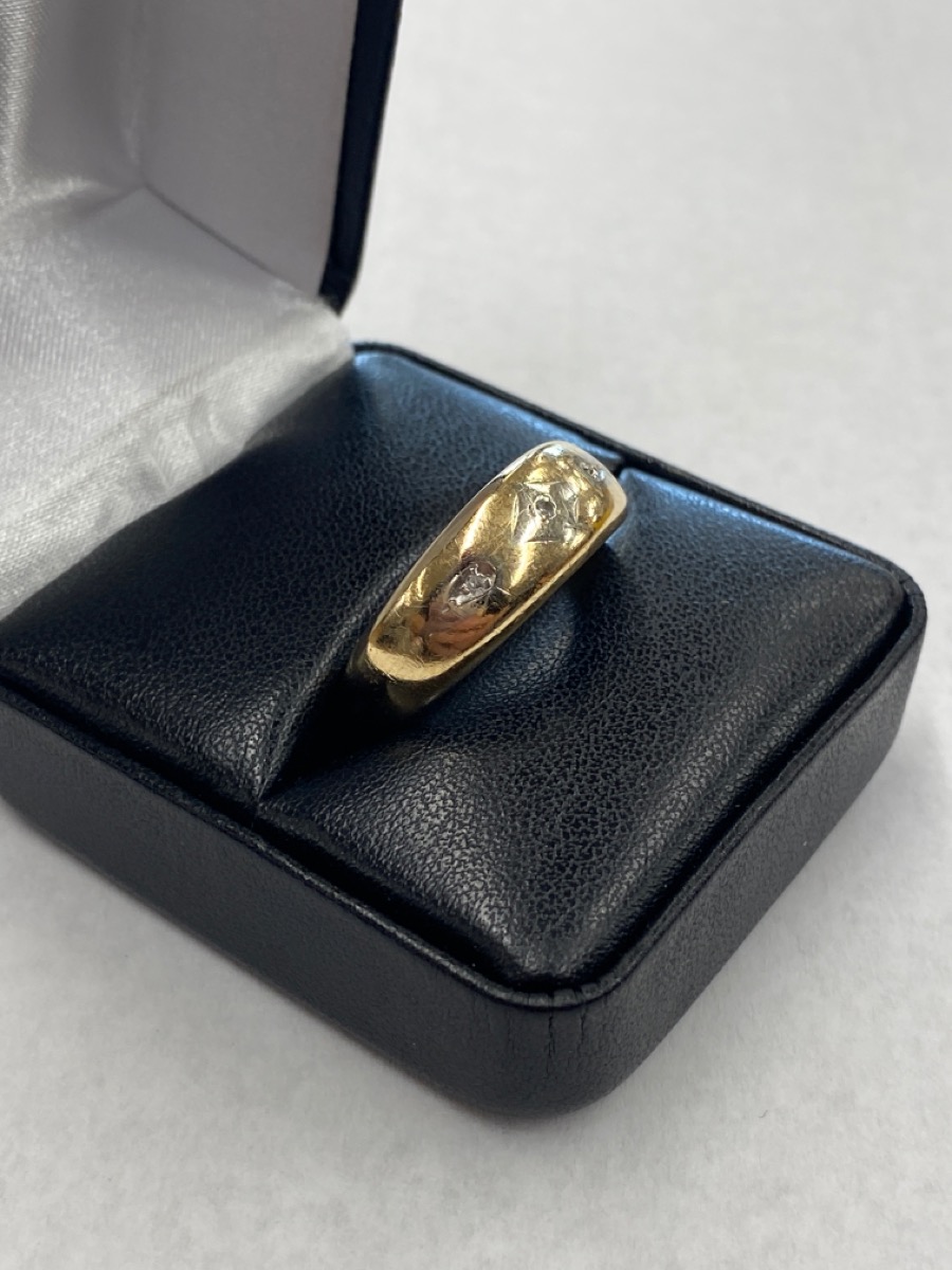 Gent's GoldDiamond Wedding Band 3 Diamonds .03 Carat T.W. 14K Yellow