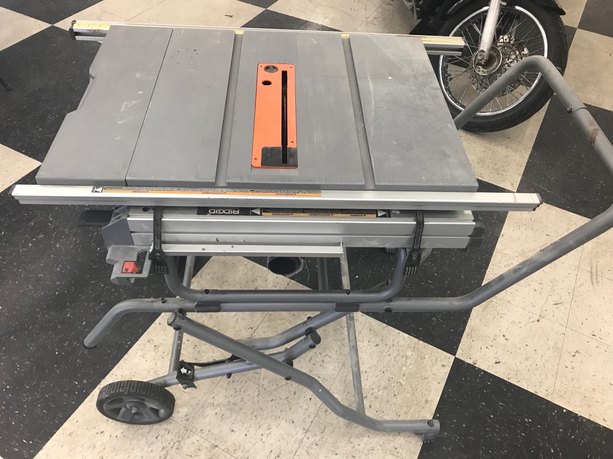 RIDGID TOOLS TABLE SAW R4514 10" TABLE SAW WITH FOLDING WHEEL STAND