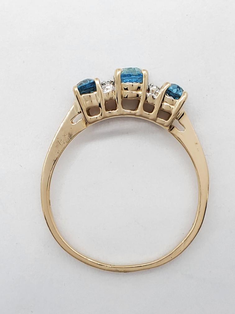 10K Solid Yellow Gold Swiss Blue Oval Cut Topaz Diamond Accent Ring ...