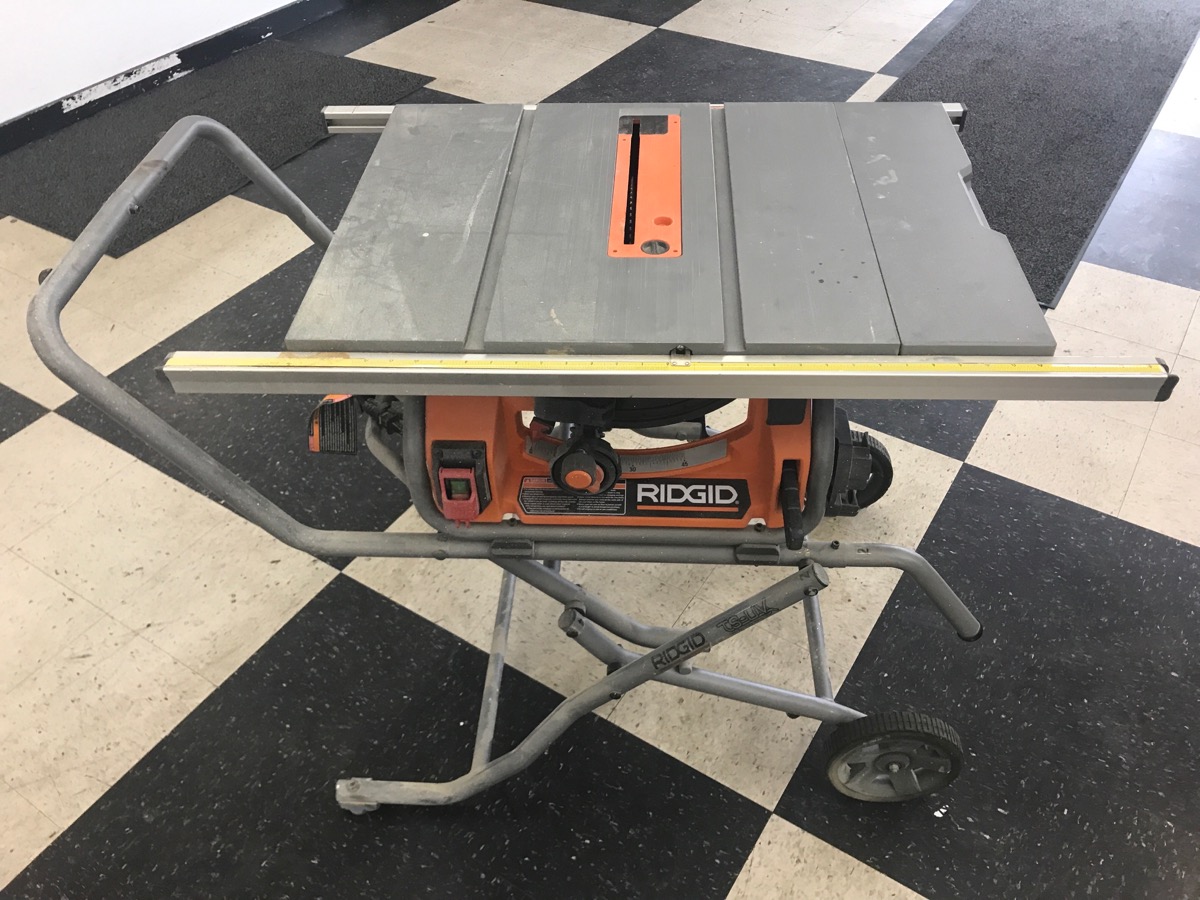 RIDGID TOOLS TABLE SAW R4514 10" TABLE SAW WITH FOLDING WHEEL STAND