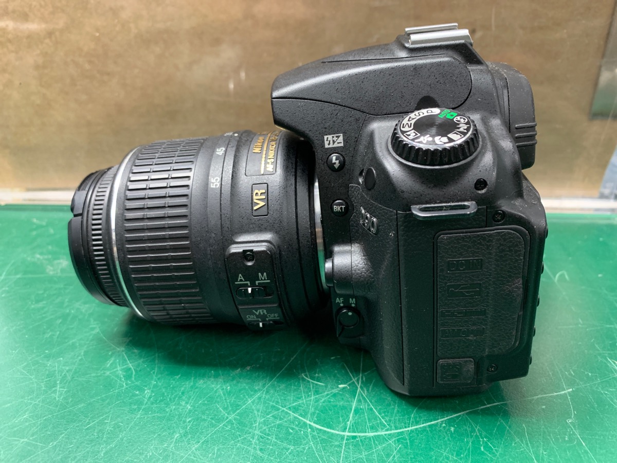 Nikon D90 DSLR Camera w/ 1855mm Lens (No SD Bay Door) Acceptable Buya