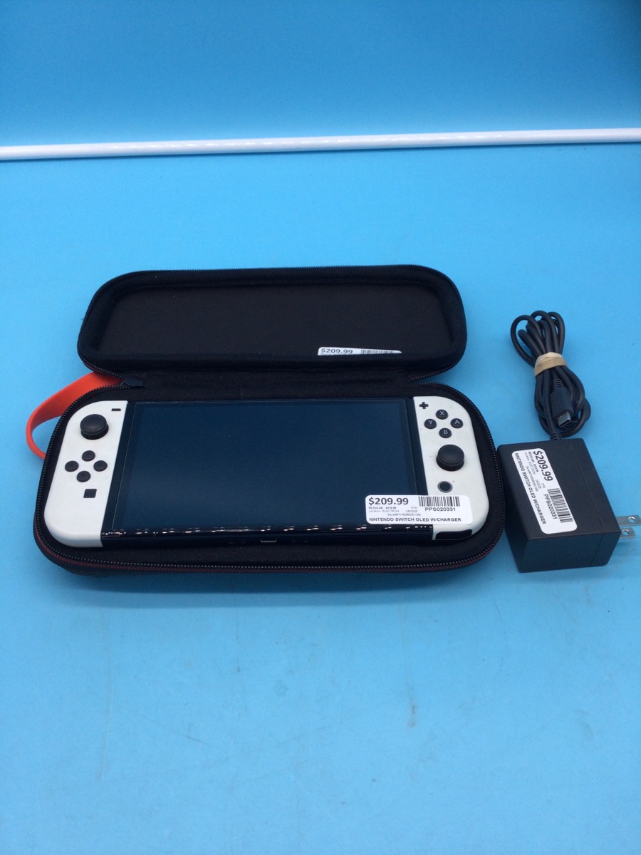Nintendo Switch Handheld Oled with Charger & Case Used photo 2