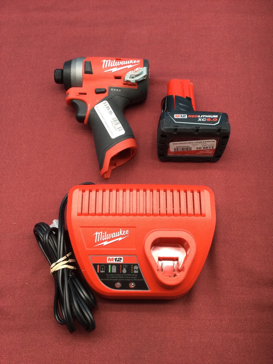 Milwaukee Impact Drill with Battery and Charger Model 2553-20