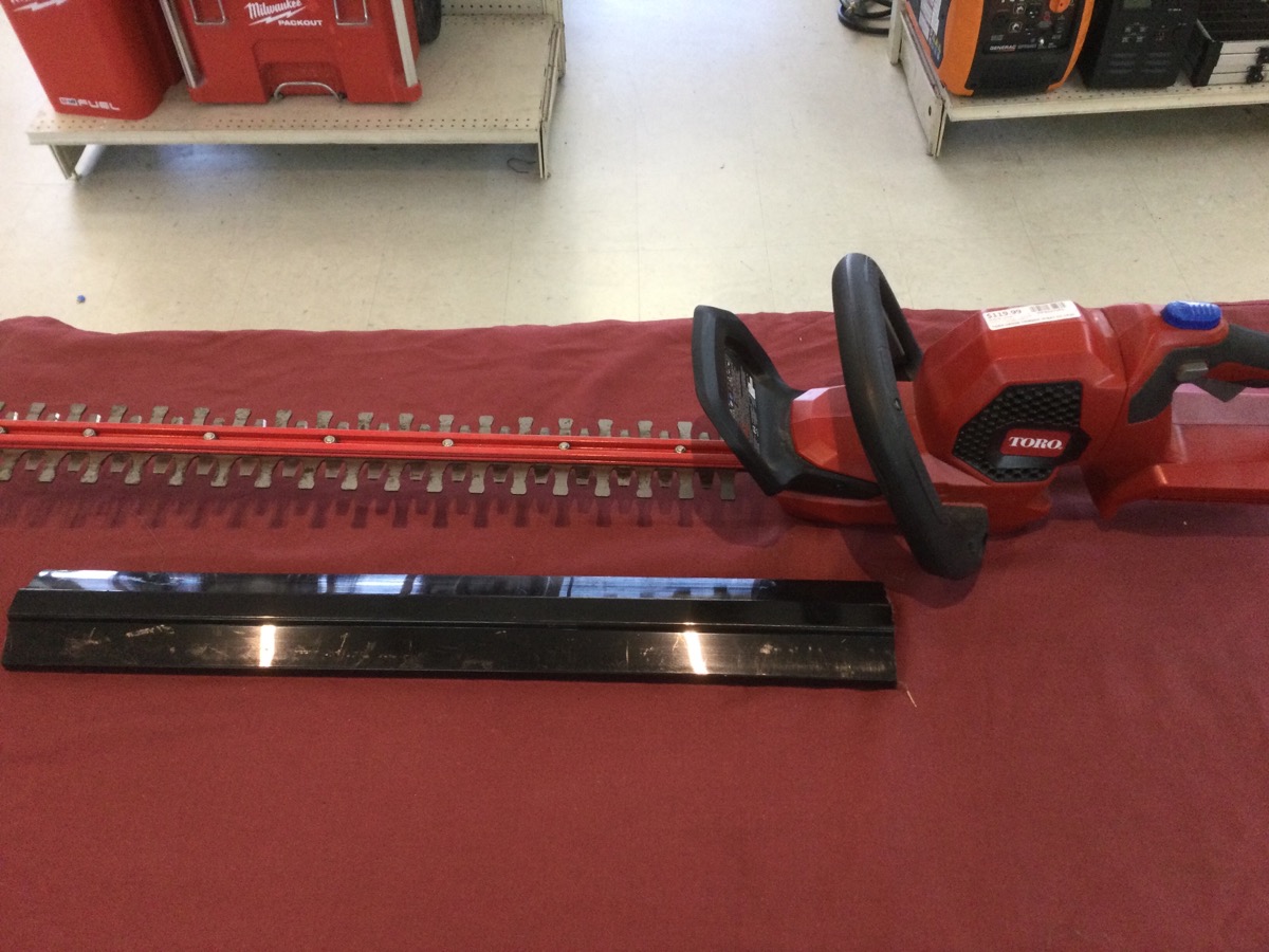 Toro Hedge Trimmer 51840 with Battery Charger Used photo 2